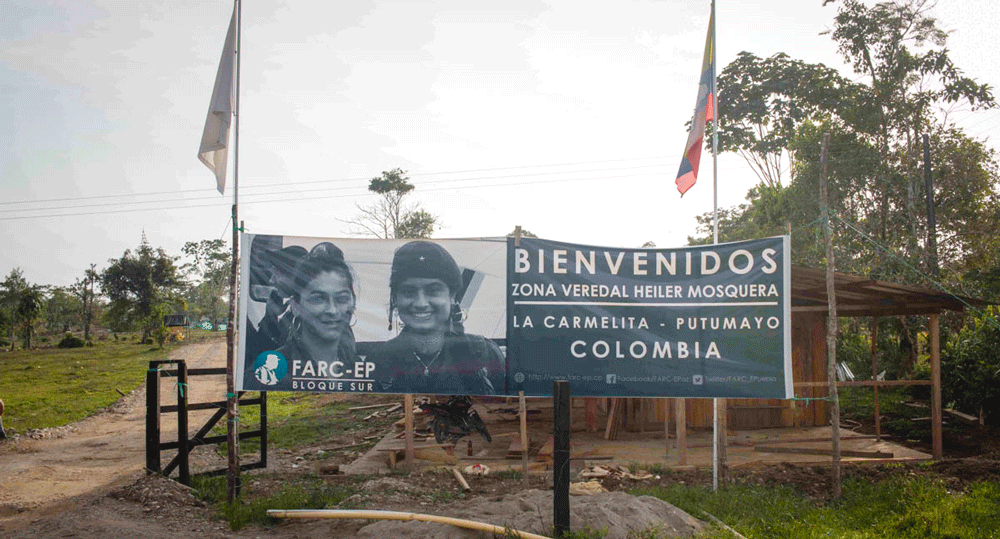 Welcome sign at the entrance to La Carmelita Green Zone, a Farc peace camp in Putumayo, Colombia